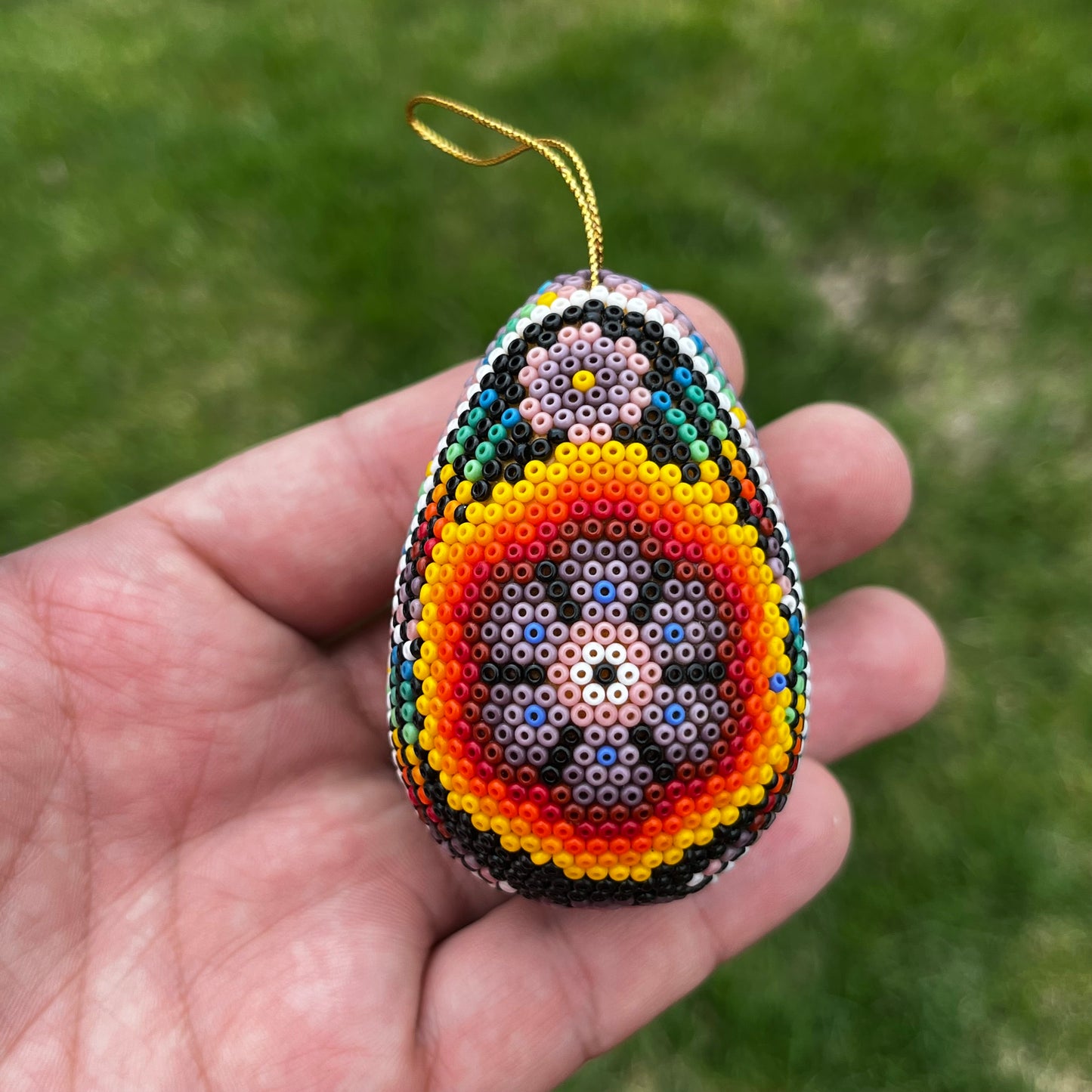 Vintage hand crafted Huichol ornament.