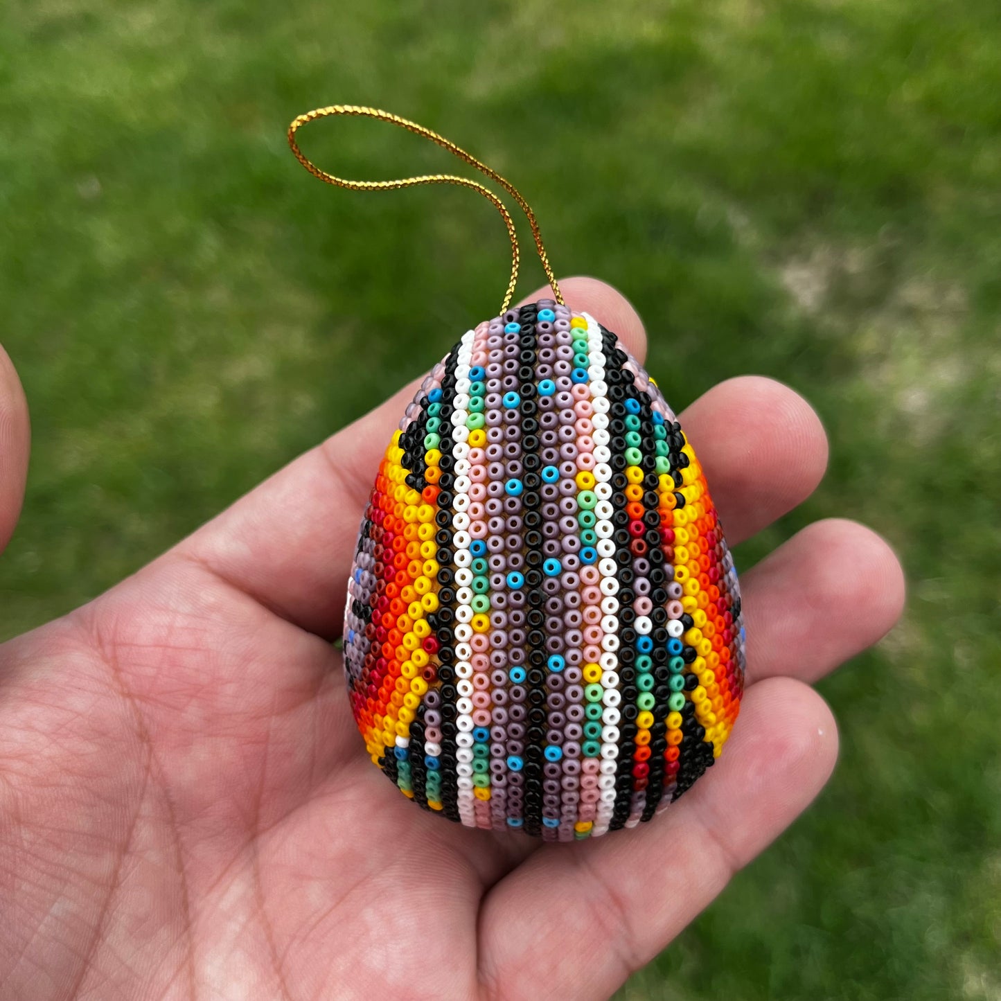 Vintage hand crafted Huichol ornament.