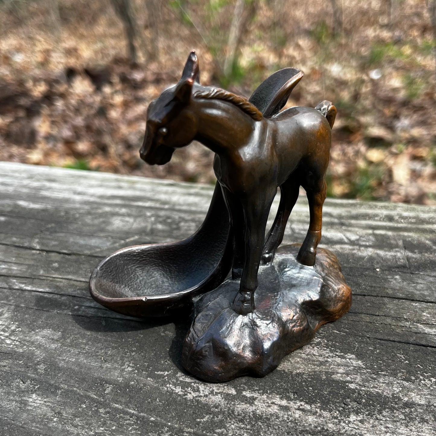 Vintage bronze horse pipe holder.