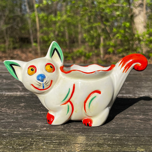 1940s Lusterware kitty dish.