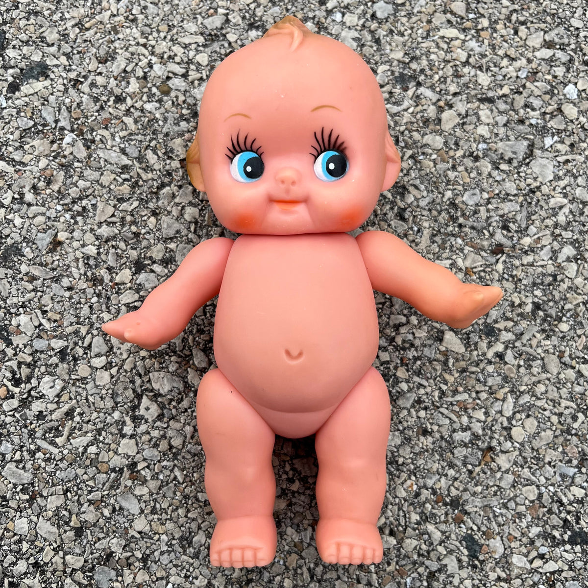 Vintage vinyl Kewpie.