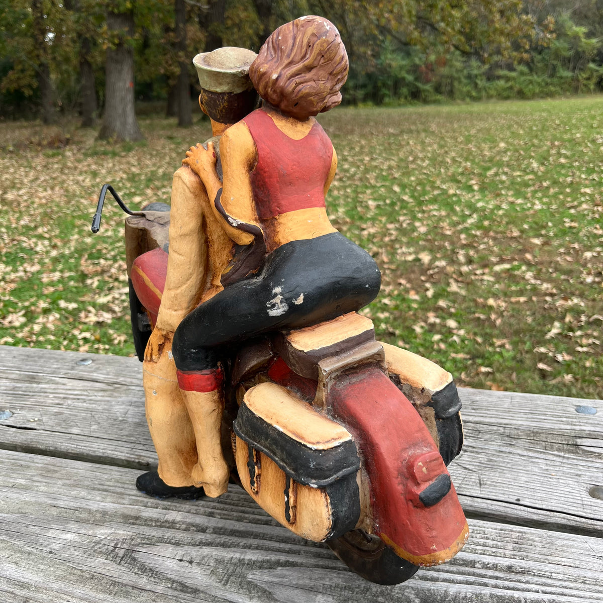 1980s Resin biker couple. (Repaired leg)