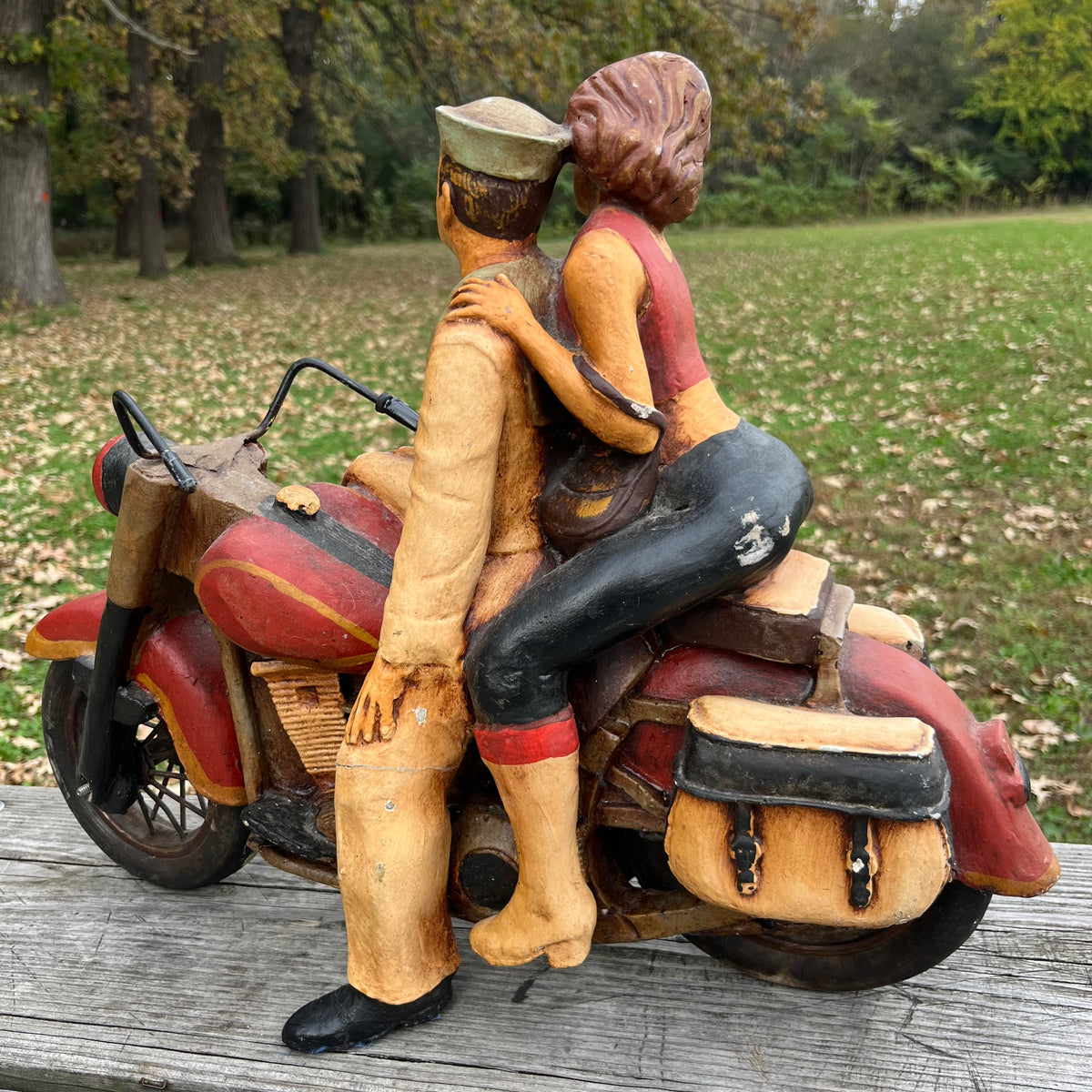 1980s Resin biker couple. (Repaired leg)