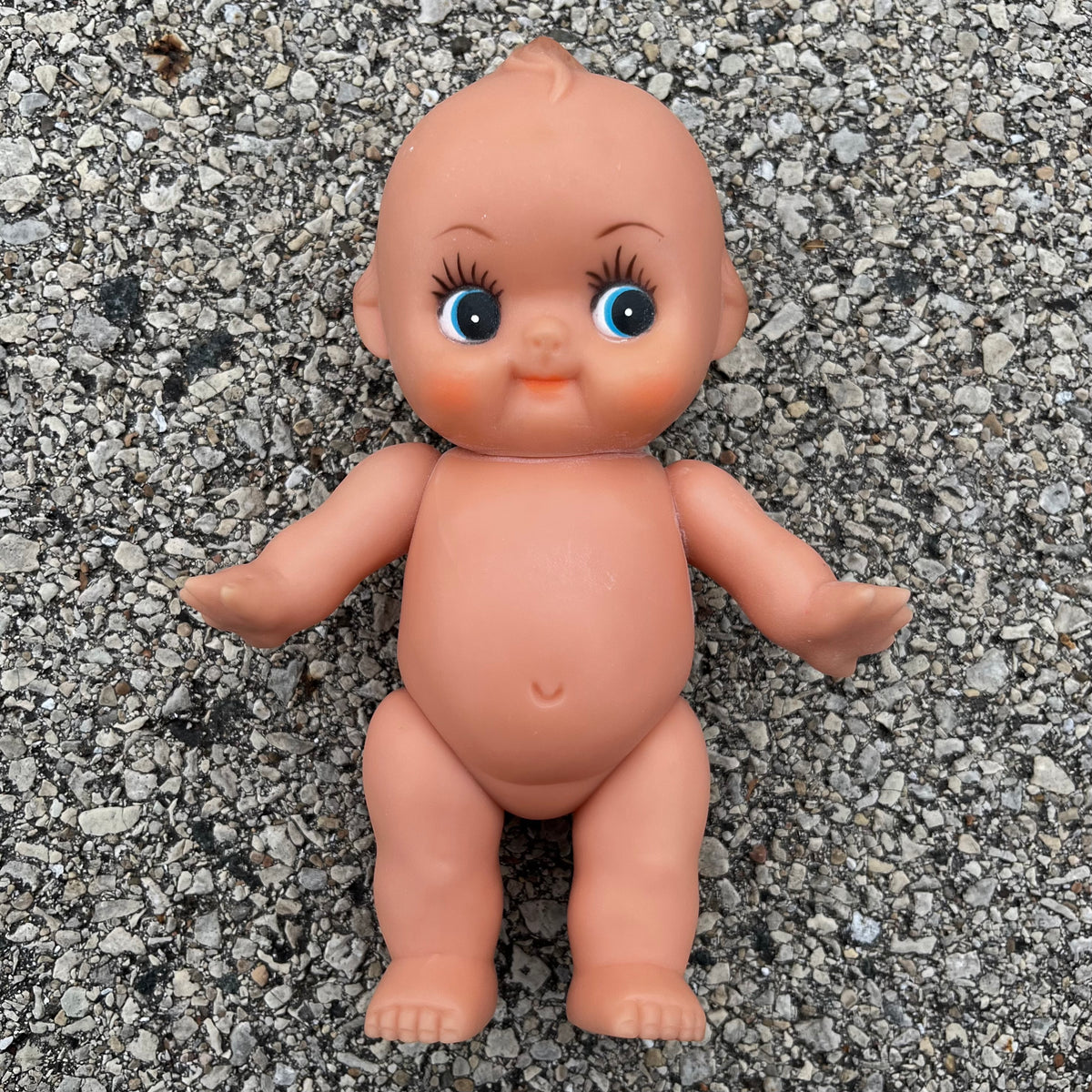 Vintage vinyl Kewpie.