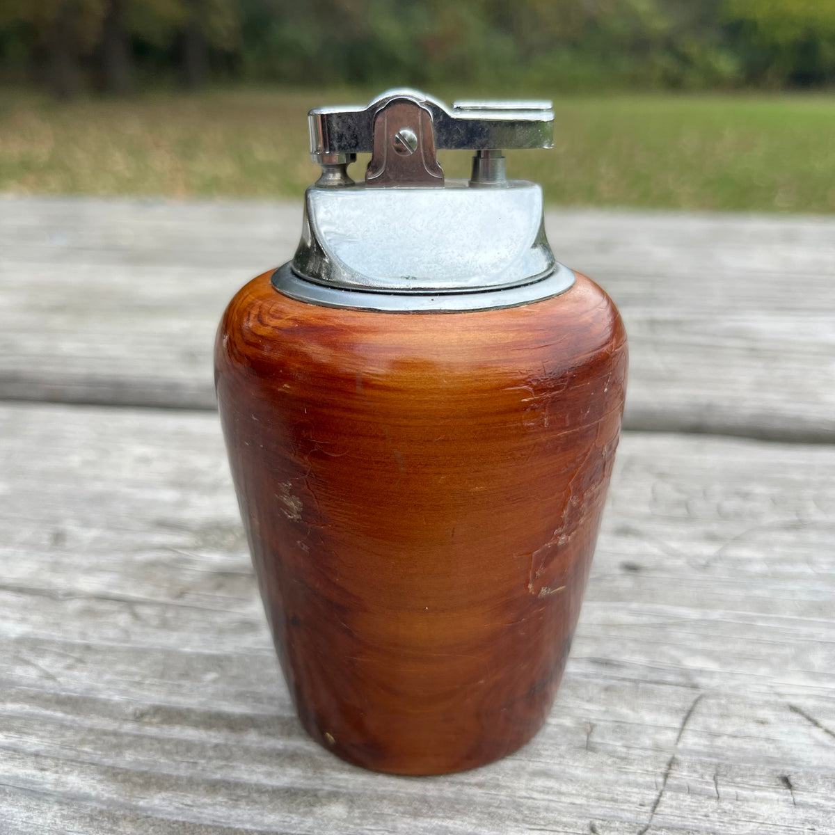 Vintage wooden tabletop lighter.