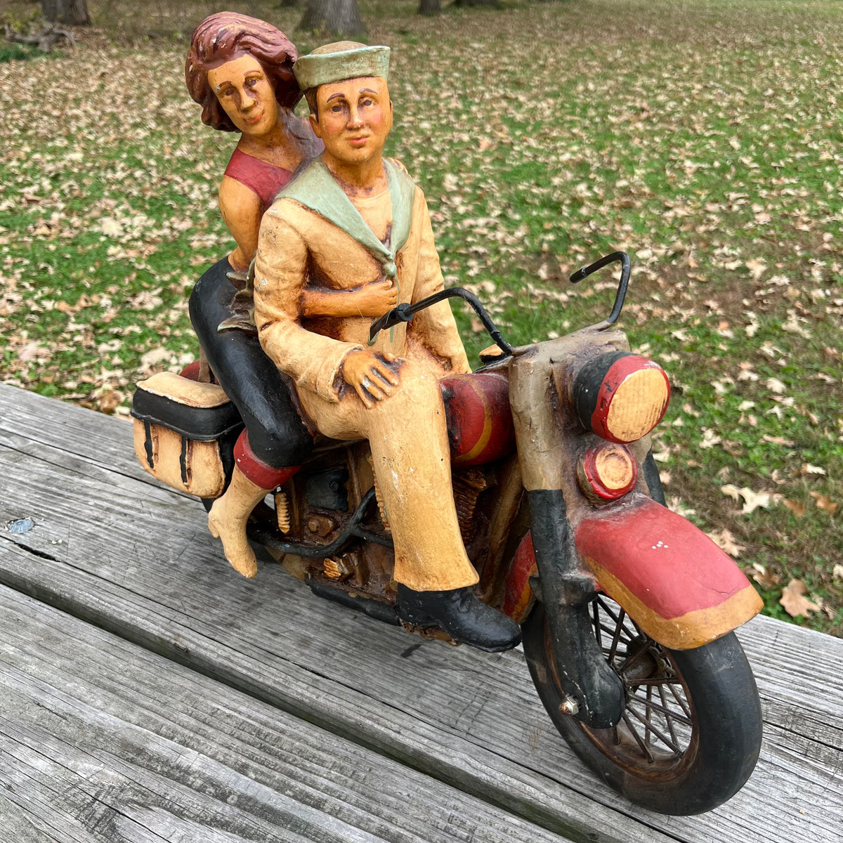 1980s Resin biker couple. (Repaired leg)