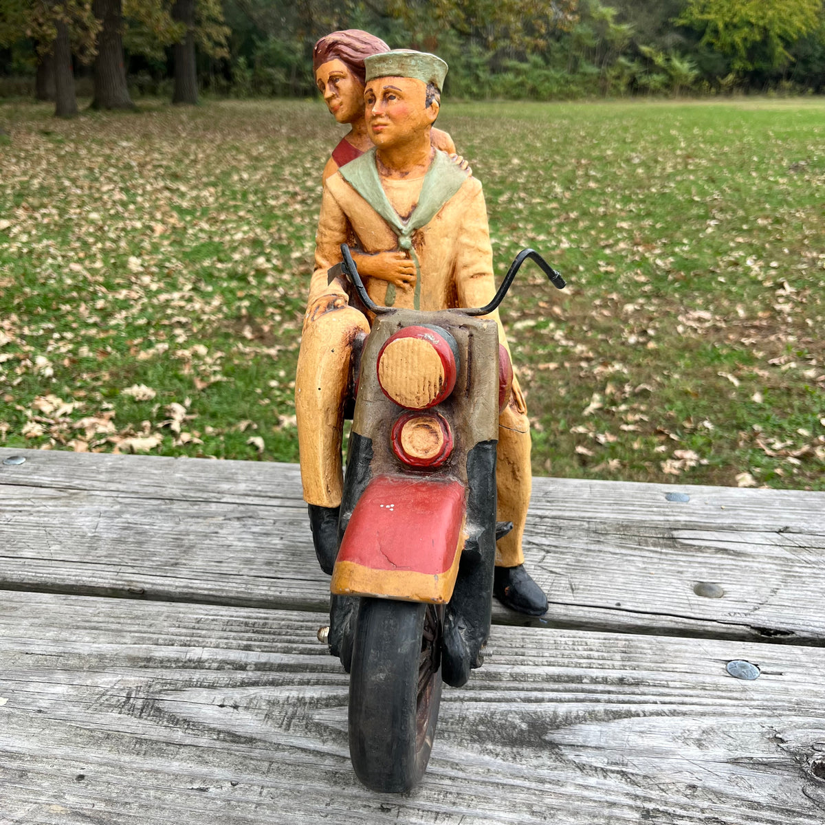 1980s Resin biker couple. (Repaired leg)