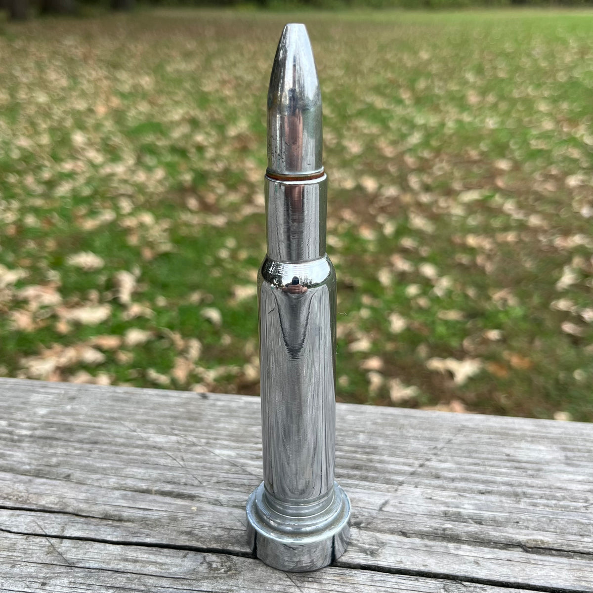 Vintage bullet tabletop lighter.