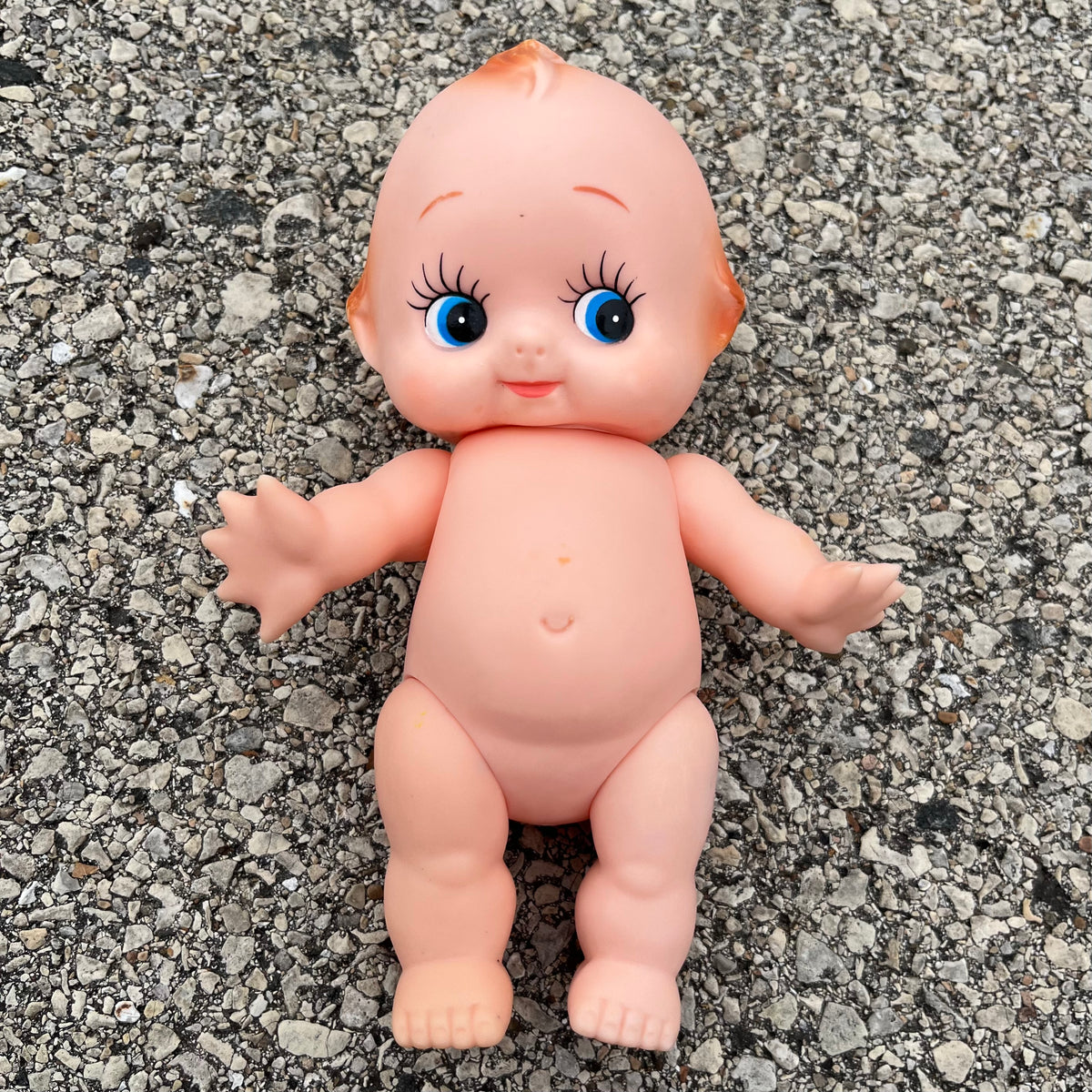 Vintage vinyl Kewpie.