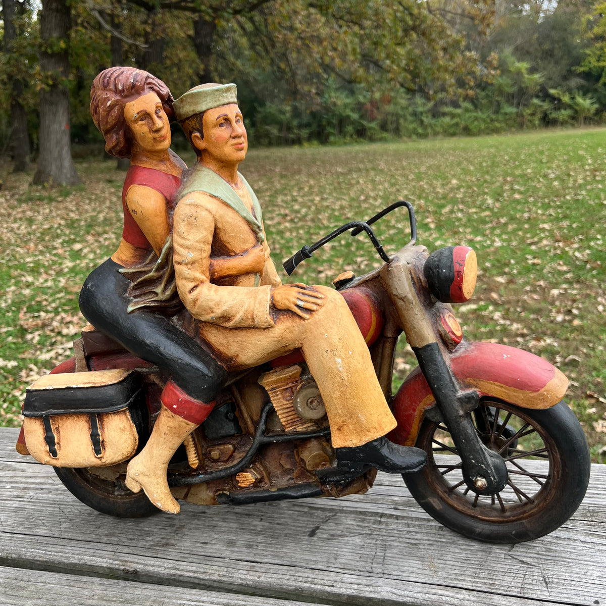 1980s Resin biker couple. (Repaired leg)