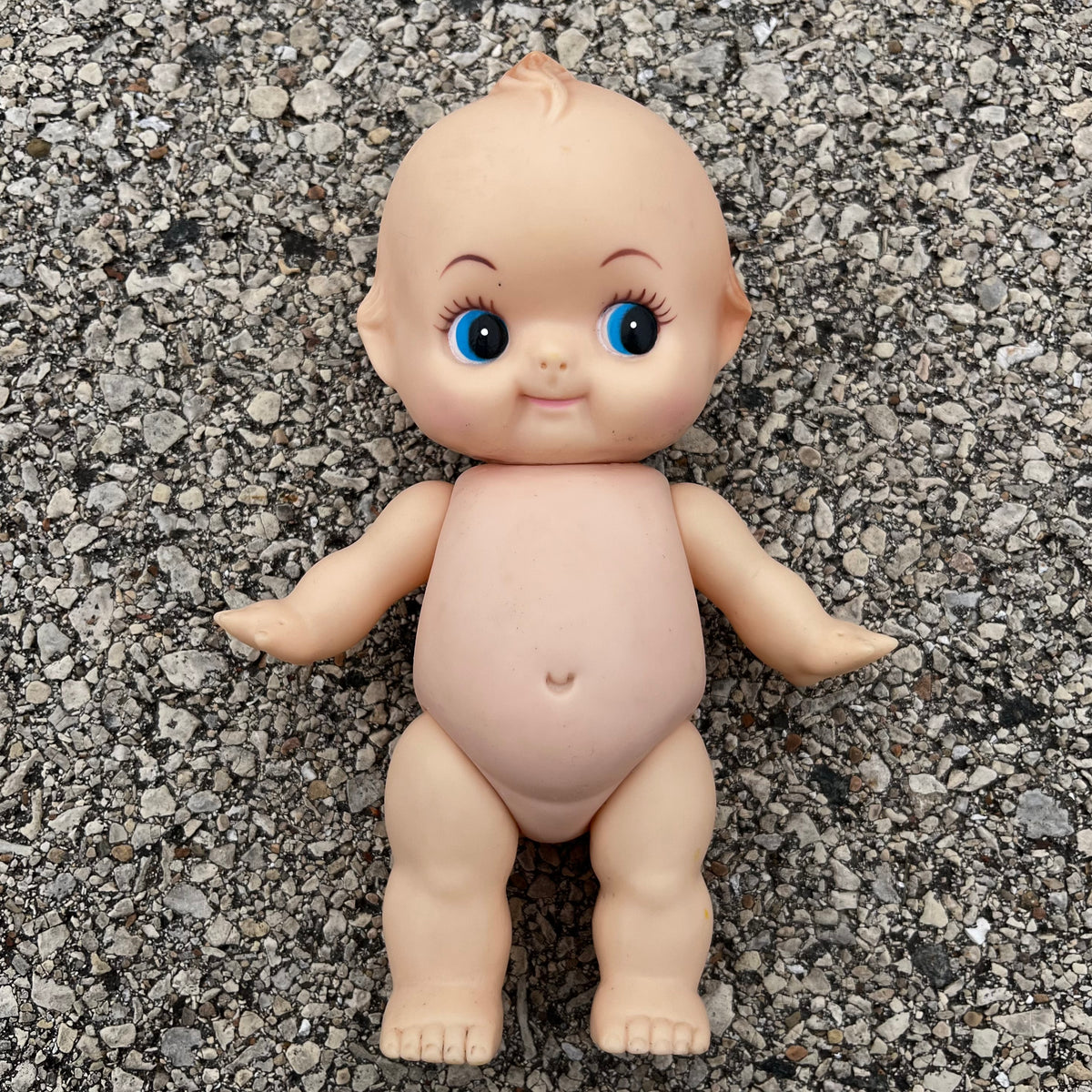 Vintage vinyl Kewpie.