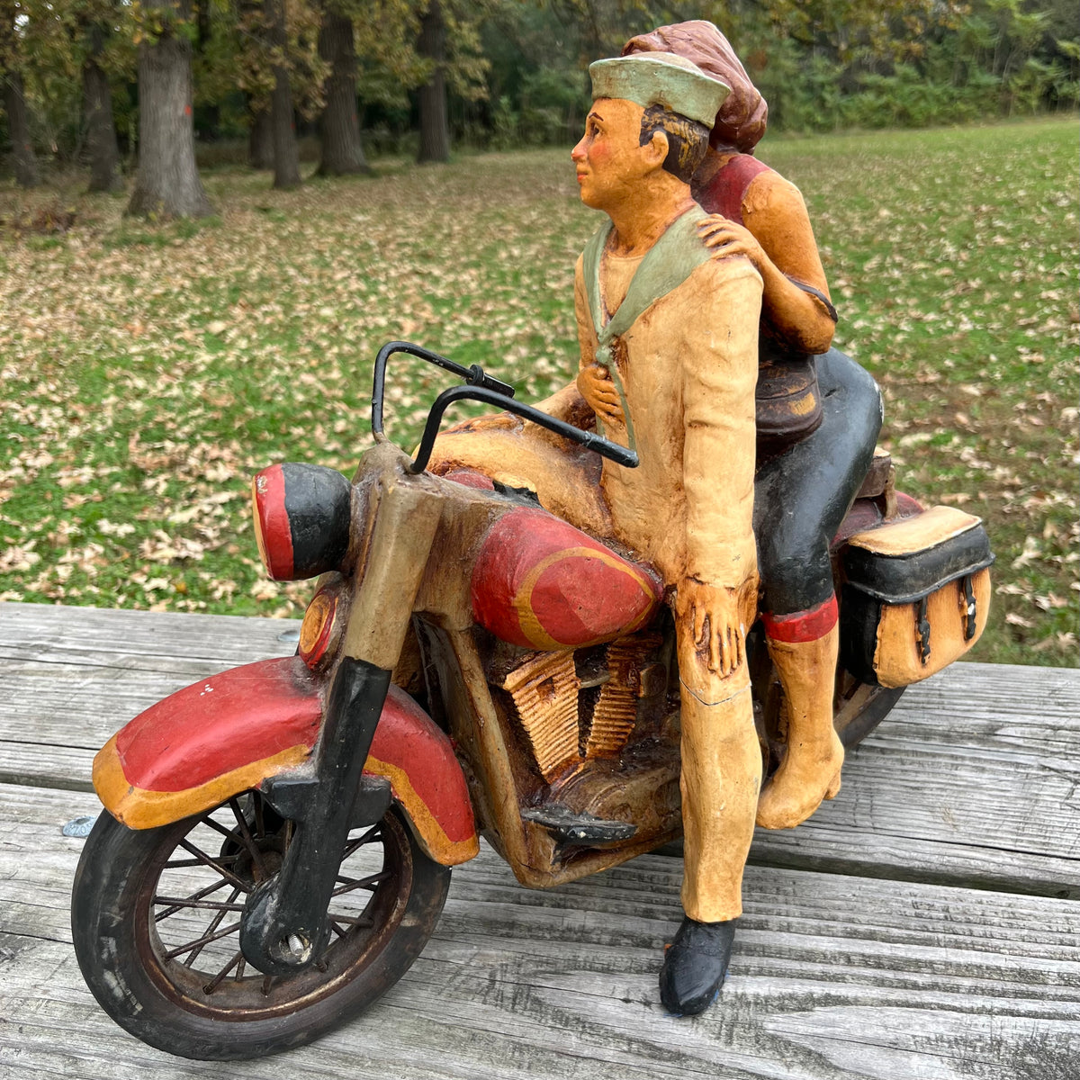 1980s Resin biker couple. (Repaired leg)